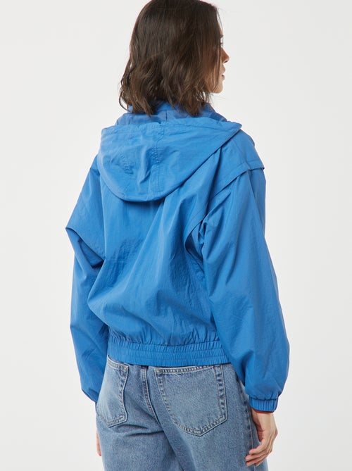 Corta-vento com capuz - Kiabi