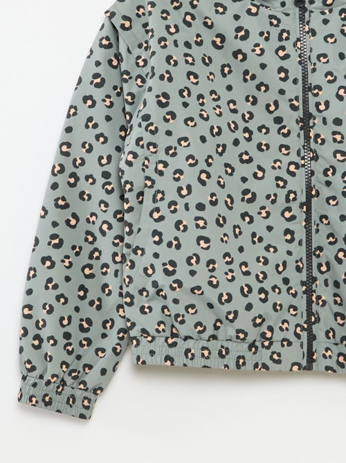 Corta-vento com capuz e base elástica - Kiabi