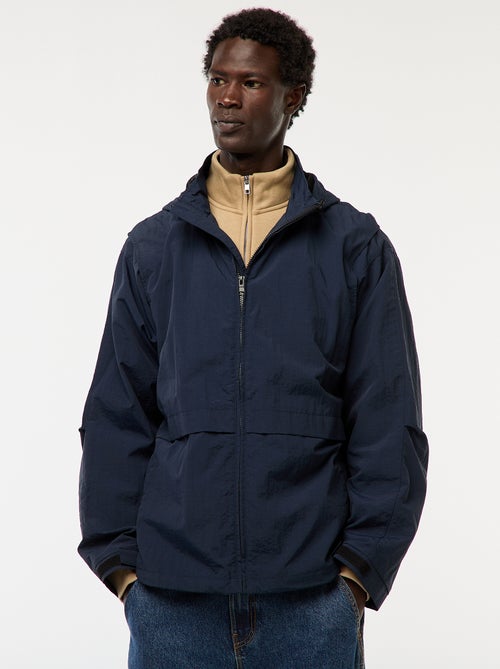 Corta-vento com capuz e mangas removíveis - Kiabi