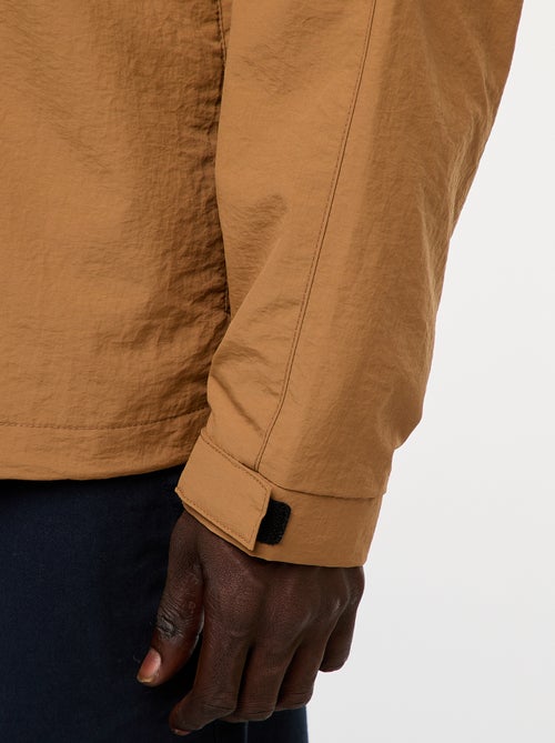 Corta-vento com capuz e mangas removíveis - Kiabi