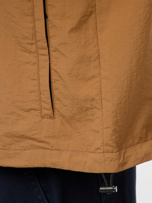 Corta-vento com capuz e mangas removíveis - Kiabi