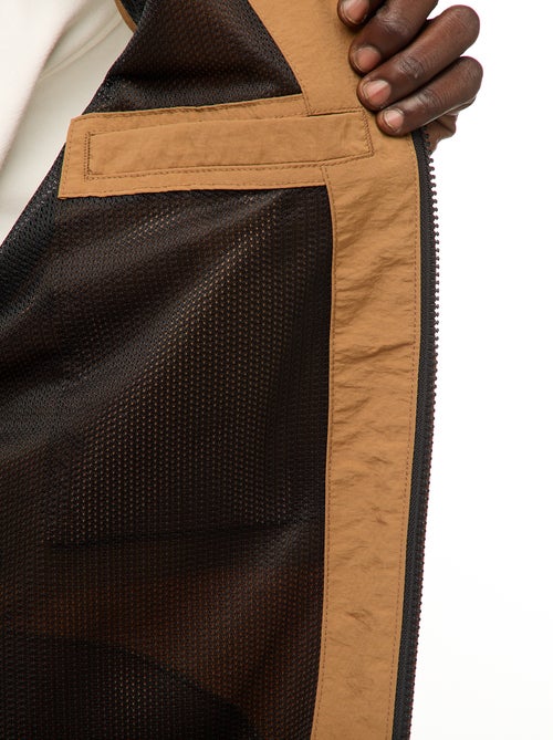 Corta-vento com capuz e mangas removíveis - Kiabi