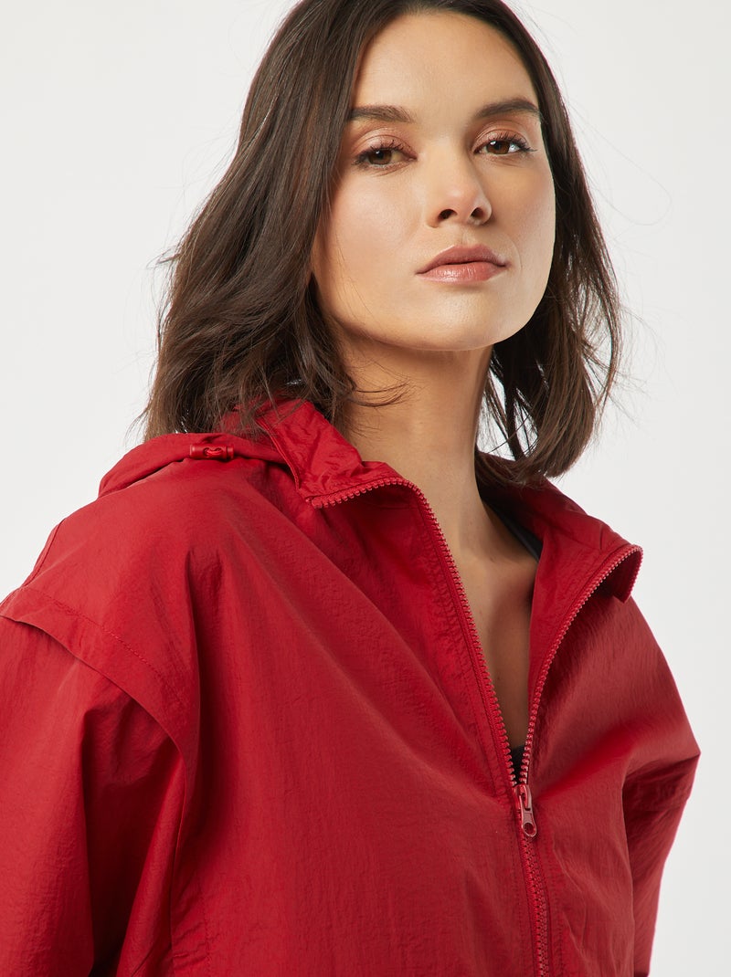 Corta-vento com capuz VERMELHO - Kiabi