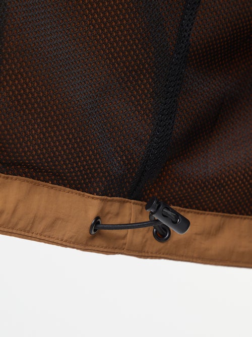 Corta-vento impermeável com capuz com mangas amovíveis - Kiabi