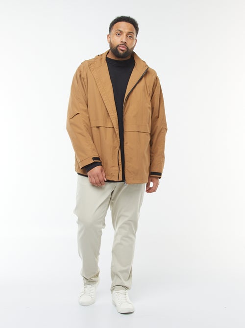 Corta-vento impermeável com capuz com mangas amovíveis - Kiabi