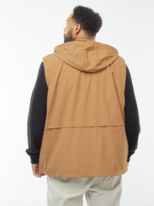 Corta-vento impermeável com capuz com mangas amovíveis - Kiabi