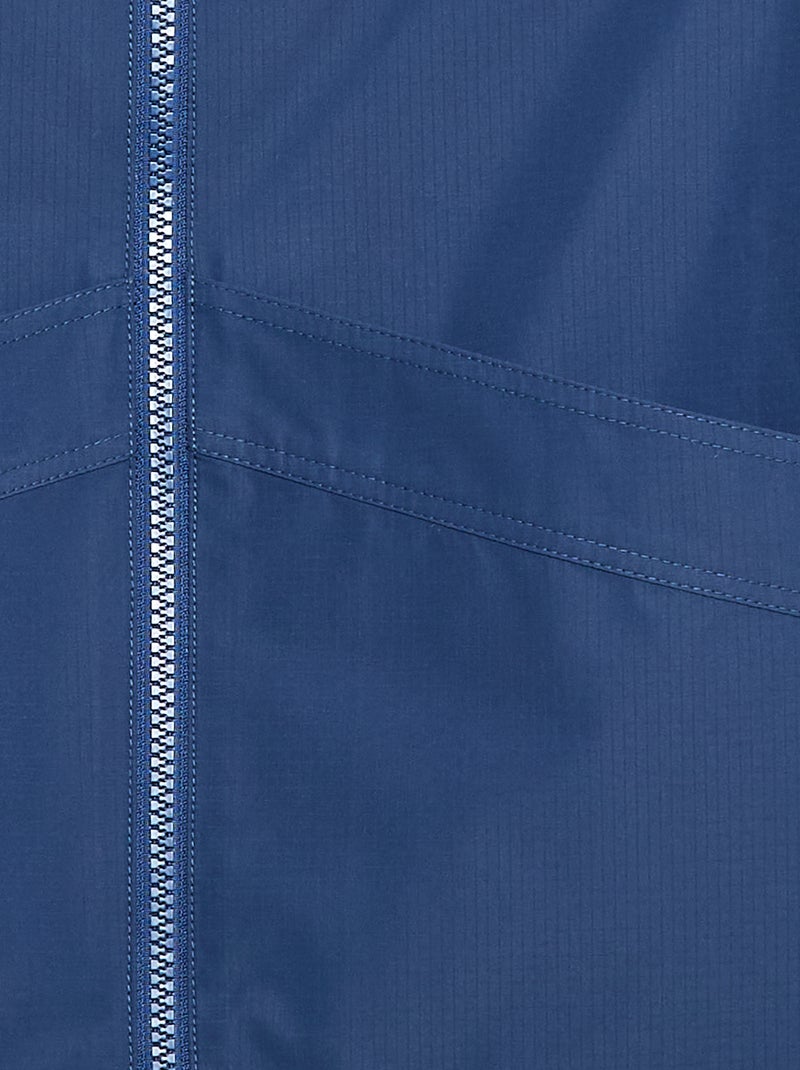 Corta-vento liso com capuz - Coleção fácil de vestir Azul - Kiabi