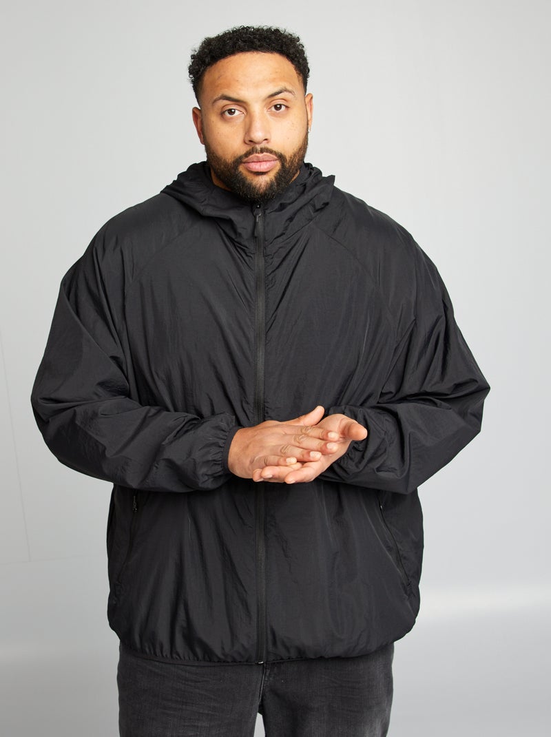 Corta-vento liso dobrável dentro do capuz Preto - Kiabi