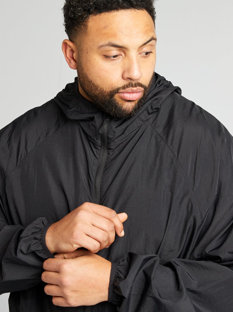 Corta-vento liso dobrável dentro do capuz Preto - Kiabi