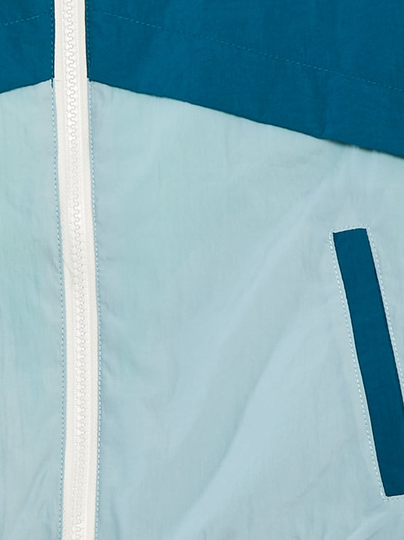 Corta-vento reversível bicolor AZUL - Kiabi