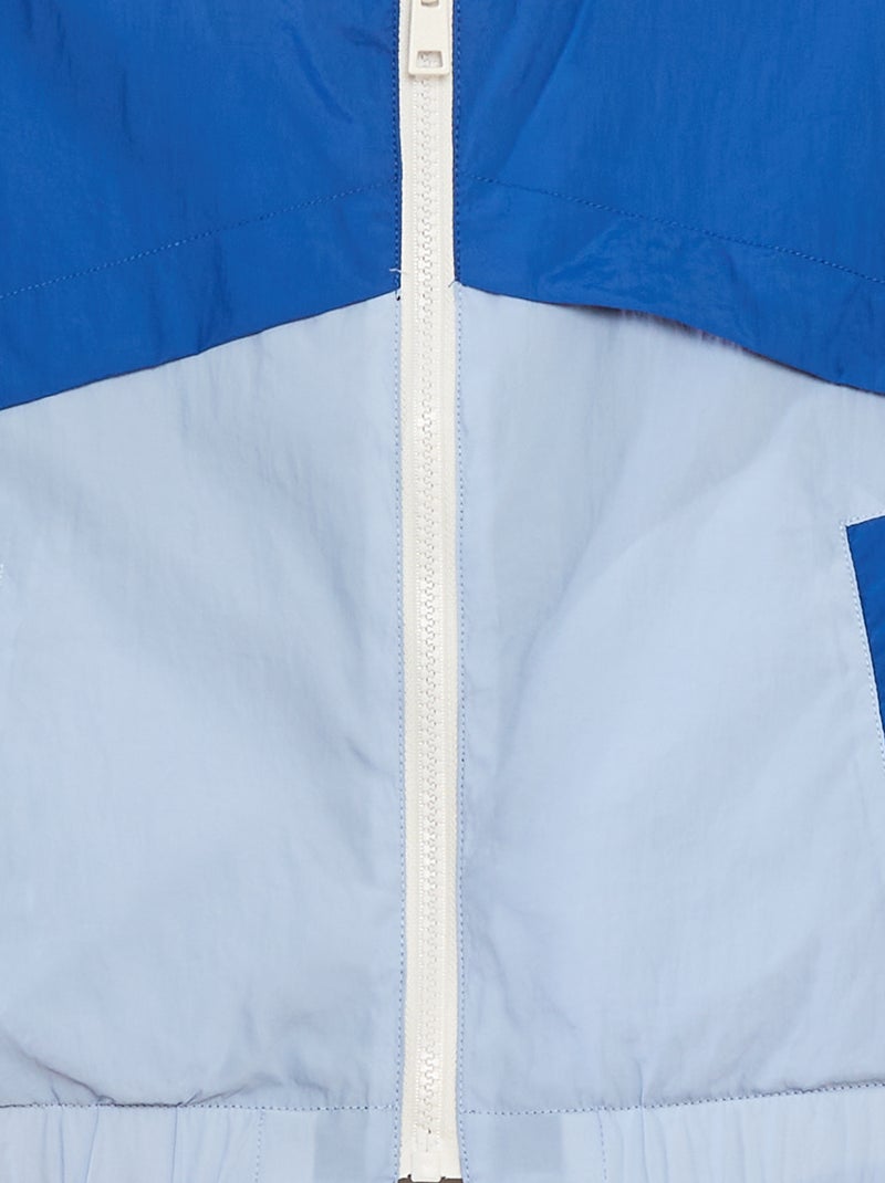 Corta-vento reversível bicolor AZUL - Kiabi