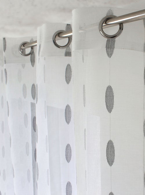 Cortina de jacquard com bolinhas ovais e ilhós - Kiabi Cortina de jacquard com bolinhas ovais e ilhós - Kiabi
