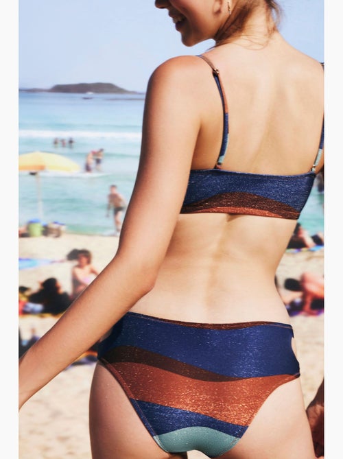 Cueca de biquíni solita com detalhe vazado penti - Kiabi Cueca de biquíni solita com detalhe vazado penti - Kiabi