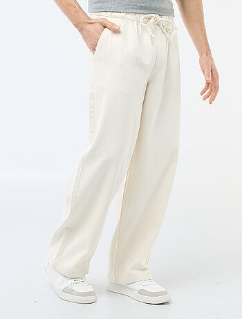 Jean de corte largo com cintura elástica