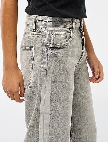 Jeans baggy com faixas prateadas