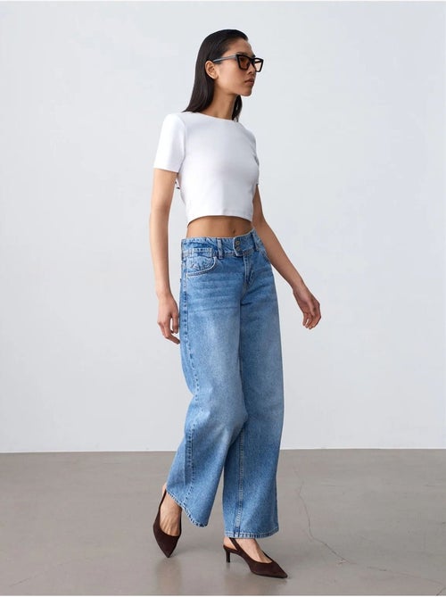 Jeans de algodão de cintura subida e perna larga dilvin - Kiabi Jeans de algodão de cintura subida e perna larga dilvin - Kiabi