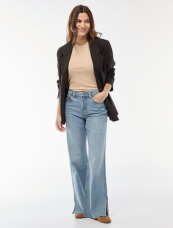 Jean cintura subida corte flare/bootcut