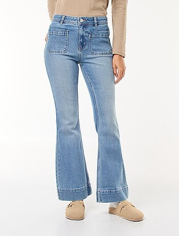 Jean cintura subida corte flare/bootcut