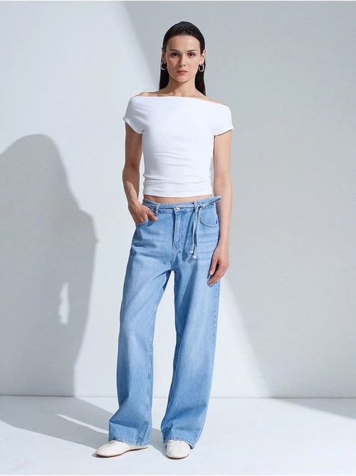 Jeans de denim de algodão de cintura alta e perna larga dilvin - Kiabi Jeans de denim de algodão de cintura alta e perna larga dilvin - Kiabi