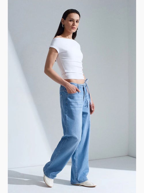 Jeans de denim de algodão de cintura alta e perna larga dilvin - Kiabi Jeans de denim de algodão de cintura alta e perna larga dilvin - Kiabi