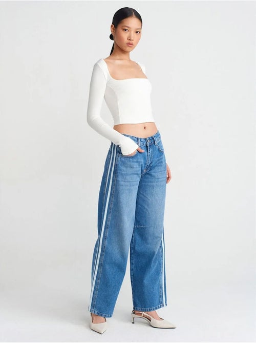 Jeans de ganga às riscas de cintura subida e perna larga e larga dilvin - Kiabi Jeans de ganga às riscas de cintura subida e perna larga e larga dilvin - Kiabi