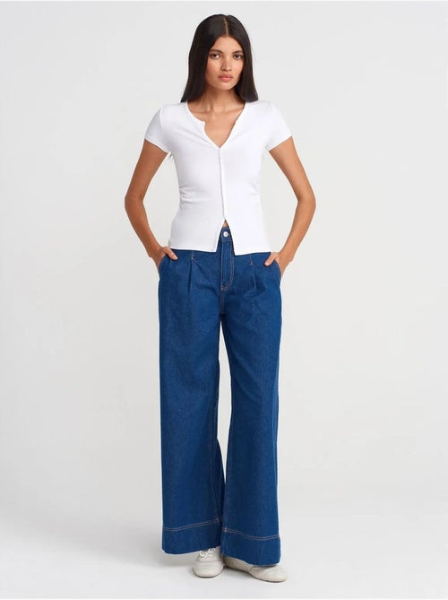 Jeans de ganga de algodão de cintura subida e perna larga dilvin - Kiabi Jeans de ganga de algodão de cintura subida e perna larga dilvin - Kiabi
