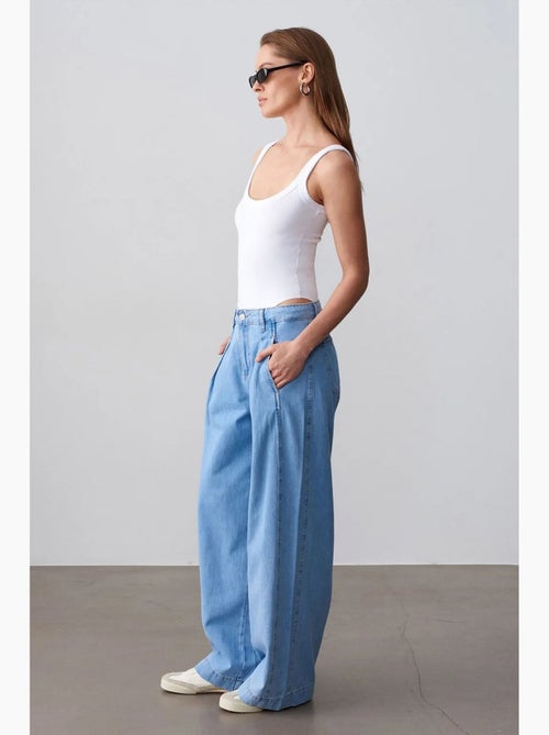 Jeans de ganga de algodão de cintura subida e perna larga dilvin - Kiabi Jeans de ganga de algodão de cintura subida e perna larga dilvin - Kiabi