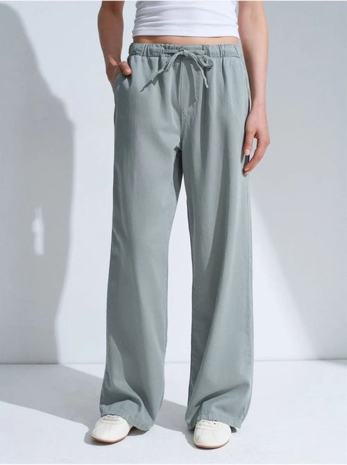 Jeans de ganga de cintura média e perna larga dilvin - Kiabi Jeans de ganga de cintura média e perna larga dilvin - Kiabi