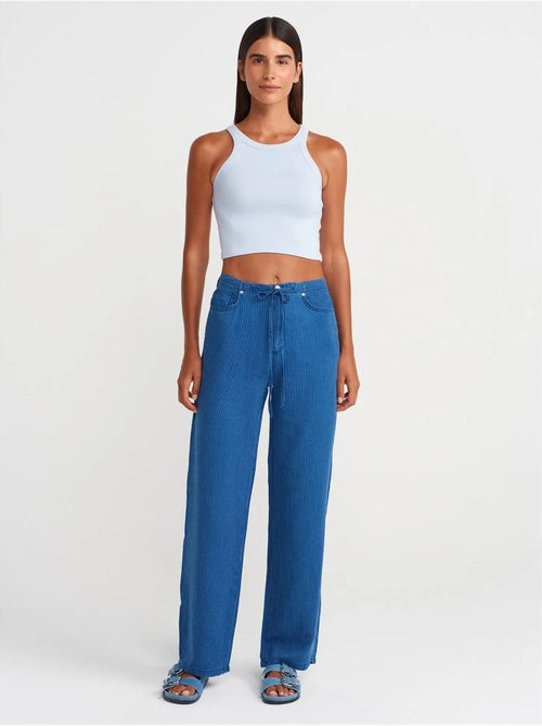 Jeans de tencel às riscas de cintura média e perna larga dilvin - Kiabi Jeans de tencel às riscas de cintura média e perna larga dilvin - Kiabi