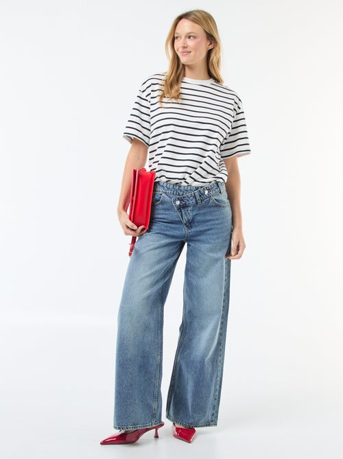 Jeans largos com abertura dupla abotoada - Kiabi