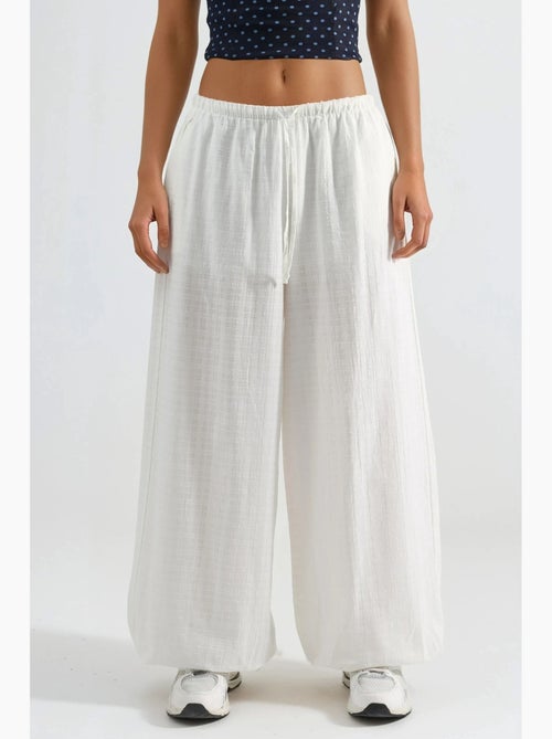Joggers largos com cintura elástica busem - Kiabi Joggers largos com cintura elástica busem - Kiabi