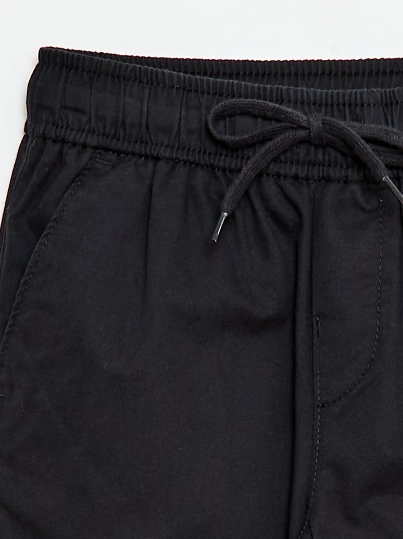 Jogpant liso com bainhas Preto - Kiabi