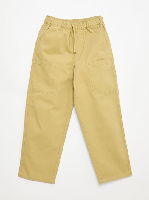 Jogpants com bolsos aplicados laterais - Kiabi Jogpants com bolsos aplicados laterais - Kiabi