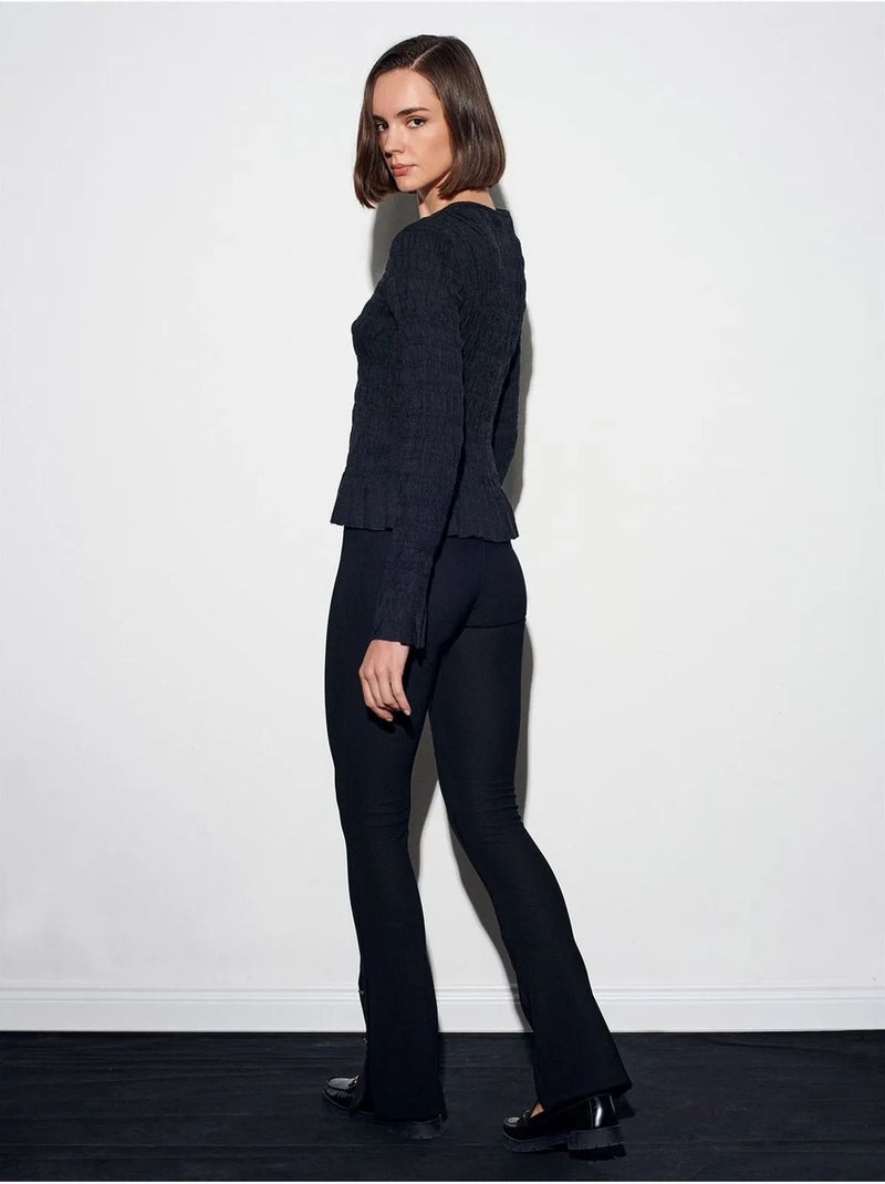 Leggings à boca de sino de cintura subida com detalhe de botões dilvin Preto - Kiabi