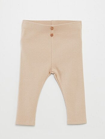 Leggings caneladas com botões