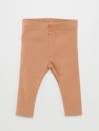 Leggings caneladas com botões