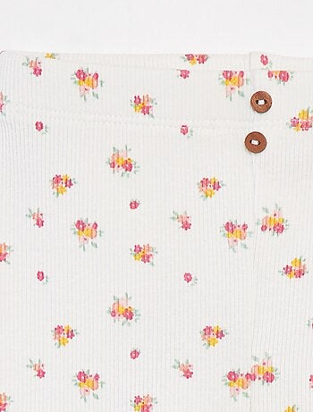 Leggings caneladas com botões de fantasia