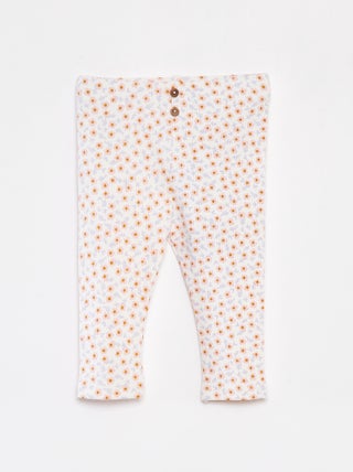 Leggings caneladas com botões de fantasia