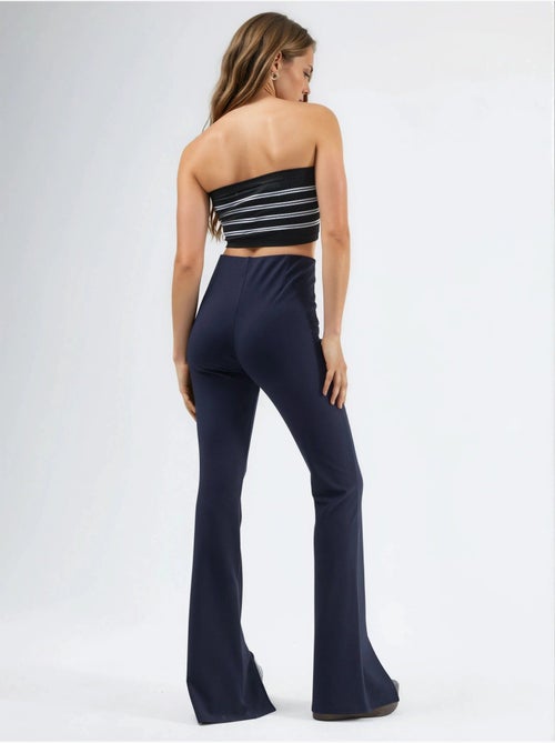 Leggings de cintura subida à boca de sino com racha busem - Kiabi Leggings de cintura subida à boca de sino com racha busem - Kiabi