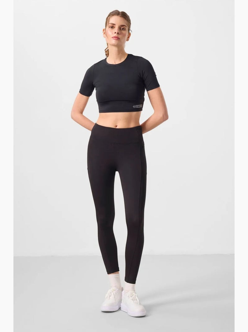 Leggings skinny de cintura subida com bolso tommy Preto - Kiabi