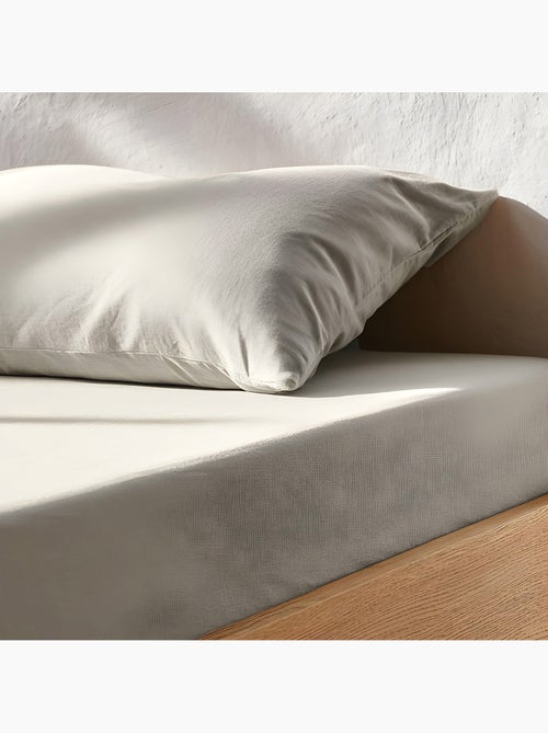 Lençol de baixo ajustável liso 100% algodão, para colchão até 30 cm de altura - Gamusi. - Kiabi
