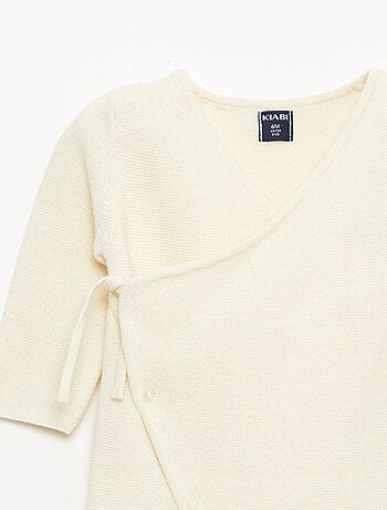 Macacão em tricô com abertura cruzada