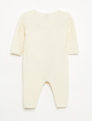 Macacão em tricô com abertura cruzada