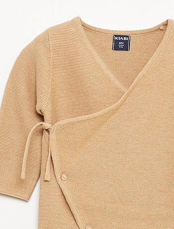 Macacão em tricô com abertura cruzada