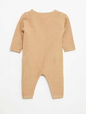 Macacão em tricô com abertura cruzada