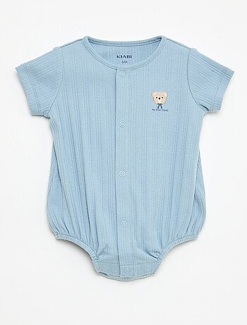 Macacão unicolor sem mangas com gola redonda