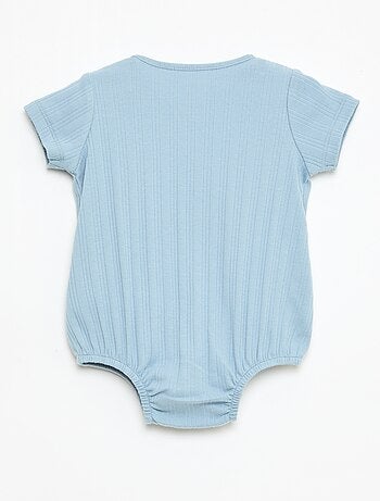 Macacão unicolor sem mangas com gola redonda