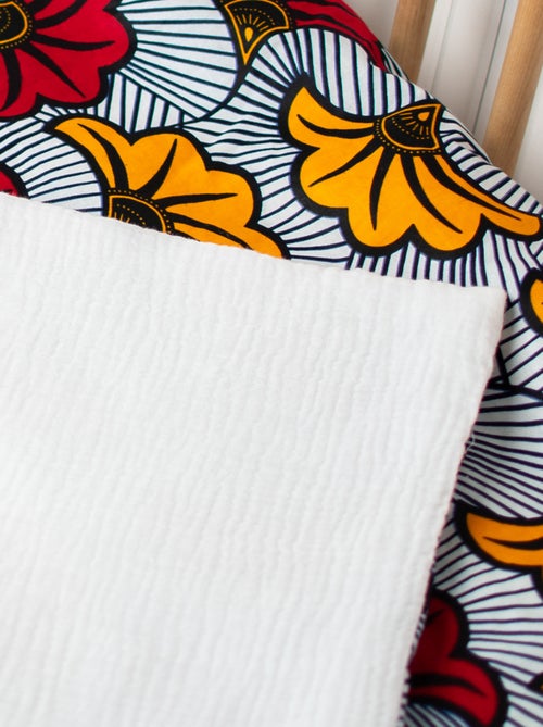 Manta de bebé reversível em wax e gaze dupla | sevira kids - Kiabi Manta de bebé reversível em wax e gaze dupla | sevira kids - Kiabi