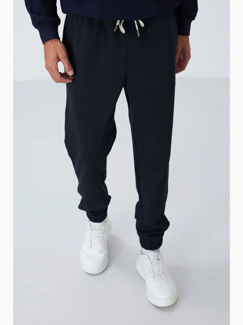 Men's calças de fato de treino em polar de corte regular tommy Índigo - Kiabi