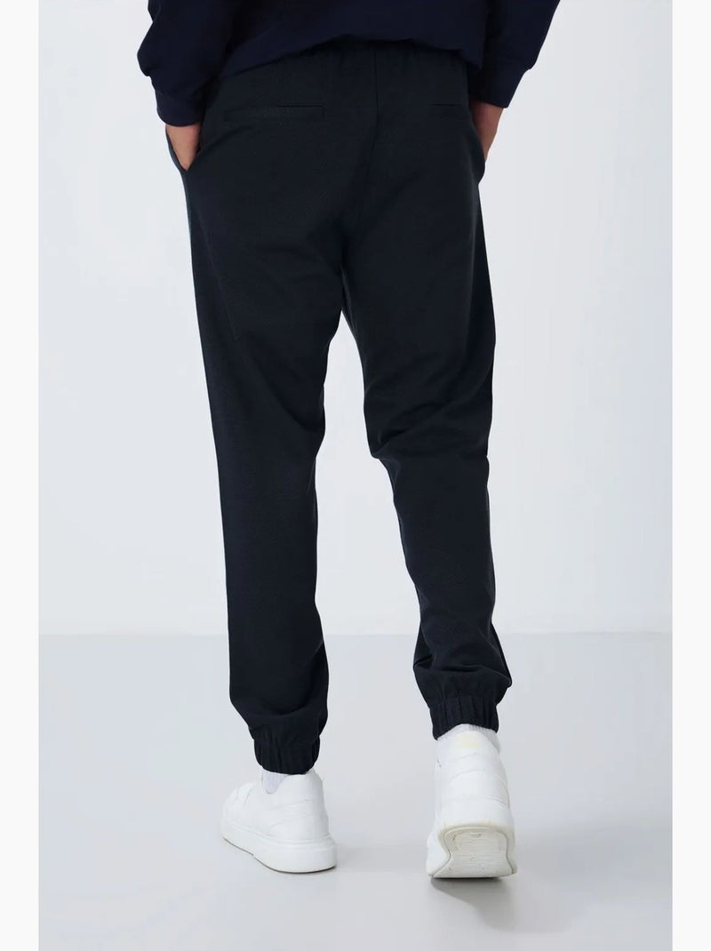 Men's calças de fato de treino em polar de corte regular tommy Índigo - Kiabi